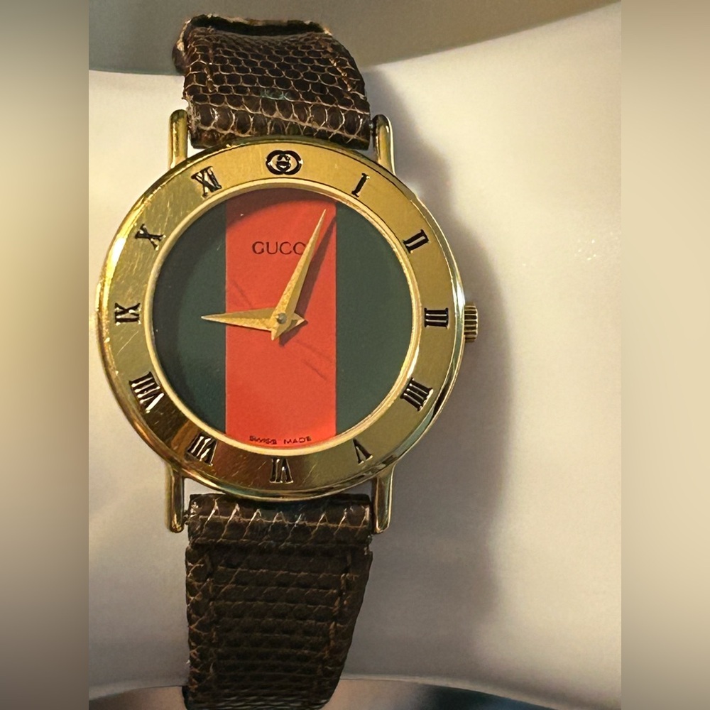 Authentic Gucci Gold Watch with Cherry Line